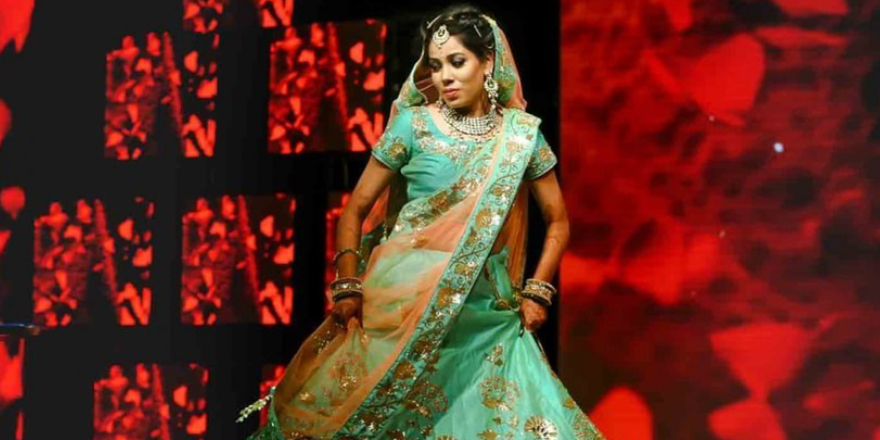 Beautiful Bride Dressed In Green Lehanga While Dancing In Her Wedding Sangeeth.