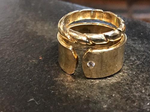 Steel Fabricated Wedding Ring Showcased On The Table.